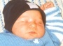 Noah im August 2000, süße vier Wochen alt.